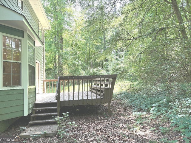 305 Glenloch Ln, Stockbridge, GA 30281 - wooden deck with a forest view
