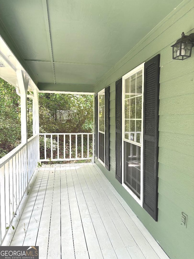 305 Glenloch Ln, Stockbridge, GA 30281 - wooden terrace featuring covered porch