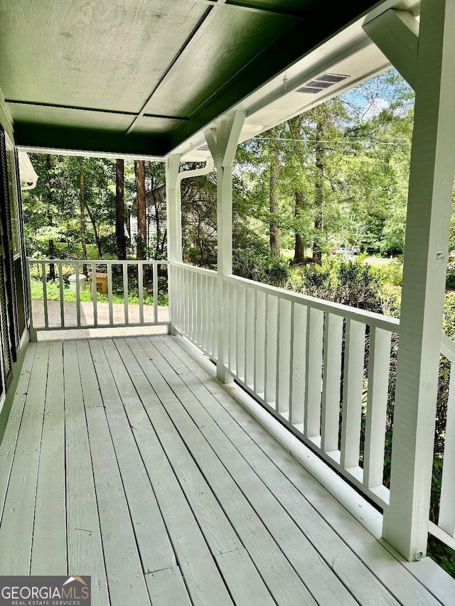 305 Glenloch Ln, Stockbridge, GA 30281 - deck with a porch and view of scattered trees