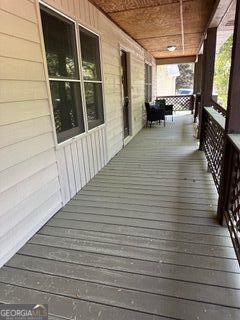 10213 Tall Pine Ct, Villa Rica, GA 30180 - view of wooden porch