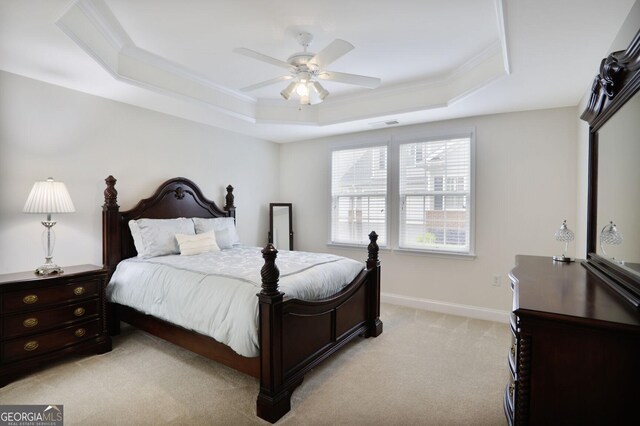 2595 Grapevine Cir, Cumming, GA 30041 - bedroom with a raised ceiling, light colored carpet, ornamental molding, baseboards, and a ceiling fan