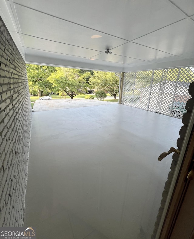 view of patio / terrace featuring a carport