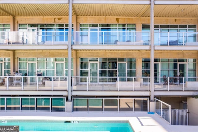 890 Memorial Dr SE Unit 105, Atlanta, GA 30316 - rear view of property featuring a balcony