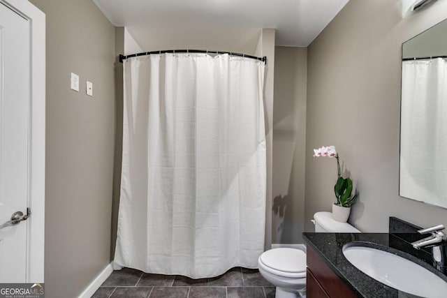 890 Memorial Dr SE Unit 105, Atlanta, GA 30316 - full bathroom featuring vanity, toilet, tile patterned flooring, and a shower with curtain