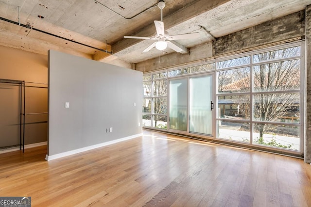 890 Memorial Dr SE Unit 105, Atlanta, GA 30316 - unfurnished room featuring ceiling fan, wood finished floors, and baseboards