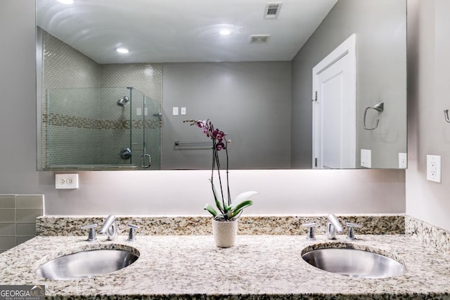 890 Memorial Dr SE Unit 105, Atlanta, GA 30316 - bathroom with a stall shower and double vanity