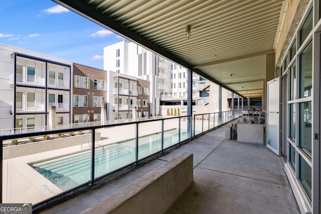 890 Memorial Dr SE Unit 105, Atlanta, GA 30316 - balcony featuring view of pool area