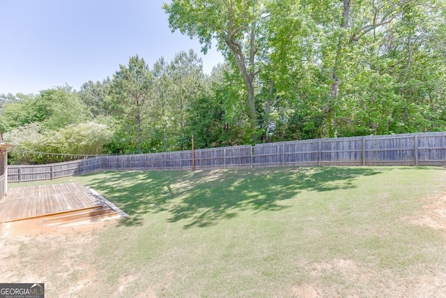 view of yard with a deck