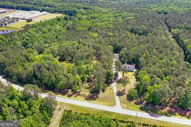 drone / aerial view of a heavily wooded area