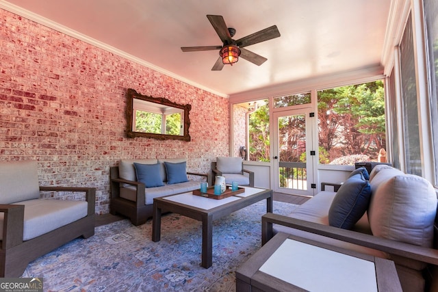 200 N Willow Ct, Alpharetta, GA 30004 - living area with a ceiling fan, plenty of natural light, ornamental molding, and brick wall