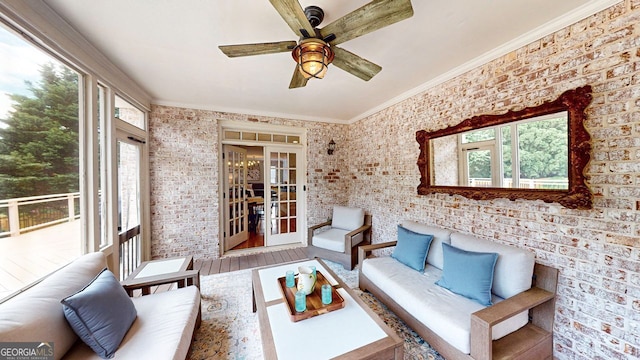 200 N Willow Ct, Alpharetta, GA 30004 - living area featuring ceiling fan, crown molding, wood finished floors, and brick wall