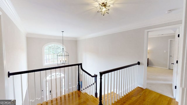 200 N Willow Ct, Alpharetta, GA 30004 - stairs featuring a chandelier, ornamental molding, and wood finished floors