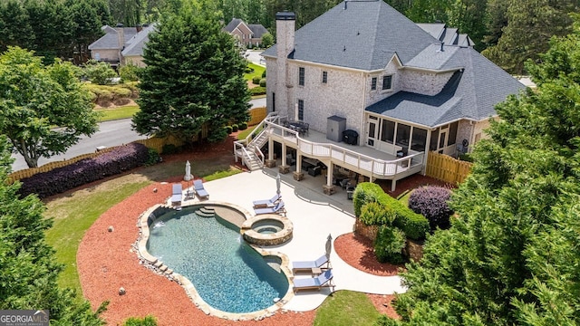 200 N Willow Ct, Alpharetta, GA 30004 - rear view of house featuring stairs, a chimney, a patio area, a deck, and a sunroom
