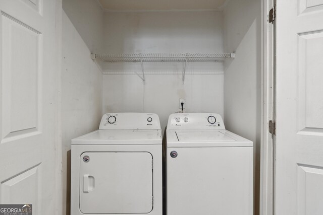 laundry area featuring washing machine and dryer