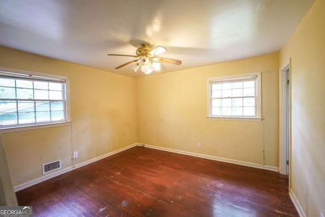 1443 Snapfinger Rd, Decatur, GA 30032 - spare room with wood-type flooring, a ceiling fan, and baseboards