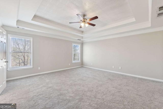 5034 Hickory Hills Dr, Woodstock, GA 30188 - unfurnished room with a raised ceiling, a ceiling fan, ornamental molding, carpet floors, and baseboards