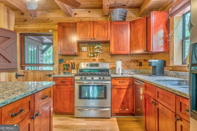 440 Treat Mountain Rd, Cedartown, GA 30125 - kitchen featuring appliances with stainless steel finishes, light wood-style floors, beam ceiling, wood ceiling, and light stone countertops