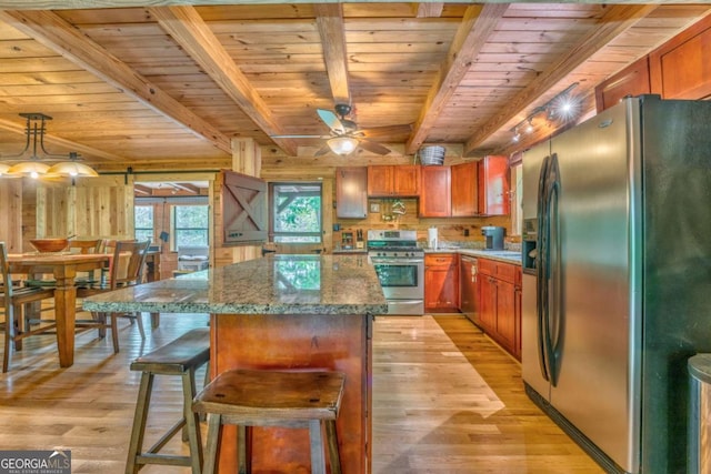 440 Treat Mountain Rd, Cedartown, GA 30125 - kitchen featuring appliances with stainless steel finishes, wood ceiling, light wood-type flooring, beam ceiling, and a kitchen island