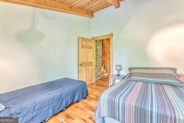 440 Treat Mountain Rd, Cedartown, GA 30125 - bedroom featuring wood ceiling, light wood-type flooring, and beamed ceiling