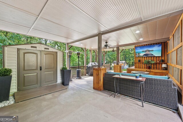 895 Freemanwood Ln, Milton, GA 30004 - view of patio / terrace with a storage shed, an outdoor structure, a ceiling fan, and area for grilling