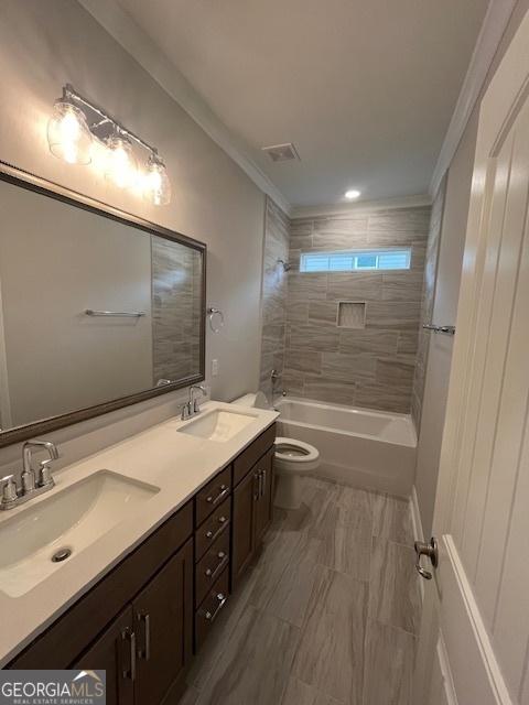 352 Harbour Island Cir, Waverly, GA 31565 - bathroom with toilet, double vanity, washtub / shower combination, and ornamental molding