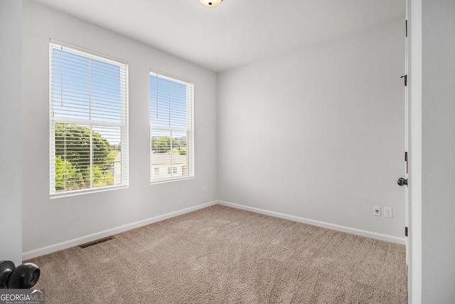 387 Skylar Way SE, Atlanta, GA 30315 - carpeted empty room featuring baseboards