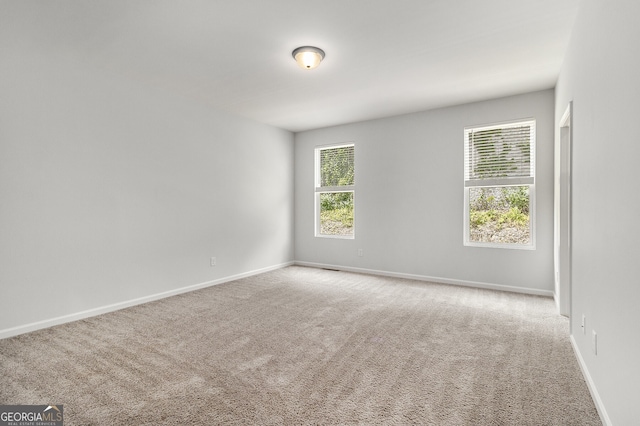 387 Skylar Way SE, Atlanta, GA 30315 - spare room with carpet floors and baseboards