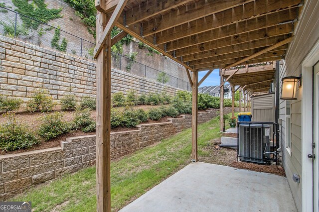 387 Skylar Way SE, Atlanta, GA 30315 - view of patio featuring central air condition unit and a fenced backyard