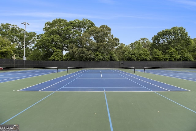 387 Skylar Way SE, Atlanta, GA 30315 - view of tennis court with community basketball court and fence