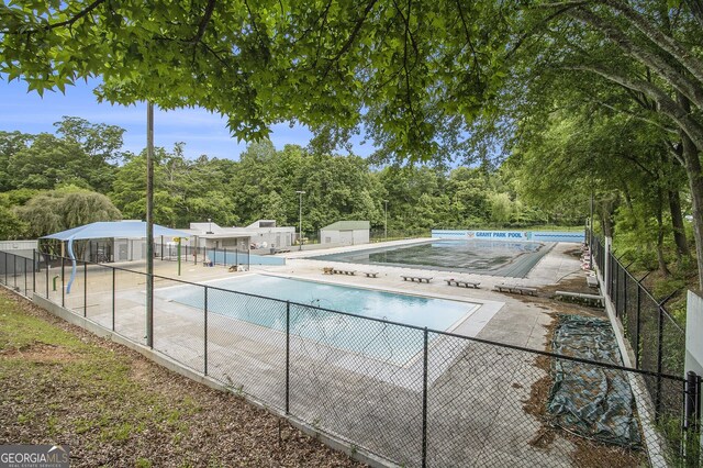 387 Skylar Way SE, Atlanta, GA 30315 - community pool featuring fence and a patio area