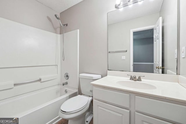 9165 Nesbit Ferry Rd # 9, Alpharetta, GA 30022 - bathroom with vanity, shower / bath combination, and a textured ceiling