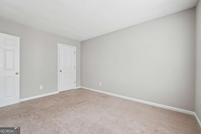 9165 Nesbit Ferry Rd # 9, Alpharetta, GA 30022 - carpeted spare room featuring baseboards