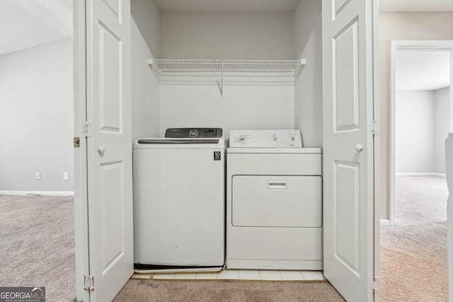 9165 Nesbit Ferry Rd # 9, Alpharetta, GA 30022 - washroom featuring carpet flooring and washer and dryer