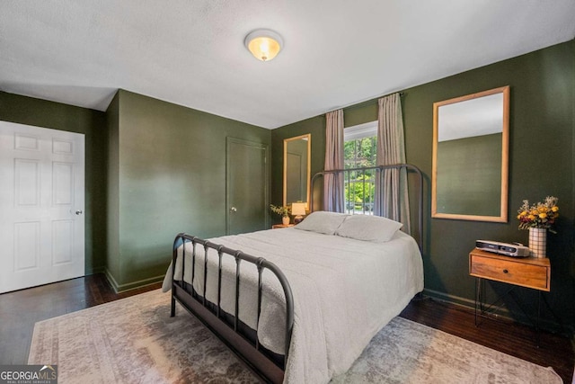 3770 Ponderosa Ln, Powder Springs, GA 30127 - bedroom featuring wood finished floors and baseboards