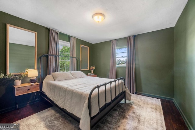3770 Ponderosa Ln, Powder Springs, GA 30127 - bedroom with wood finished floors and baseboards