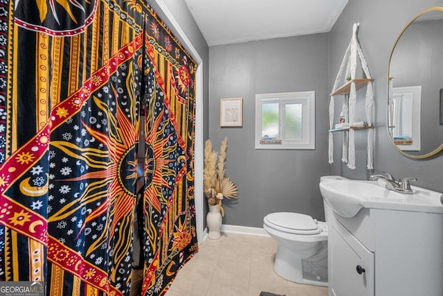 3770 Ponderosa Ln, Powder Springs, GA 30127 - full bathroom featuring tile patterned floors, vanity, toilet, and baseboards