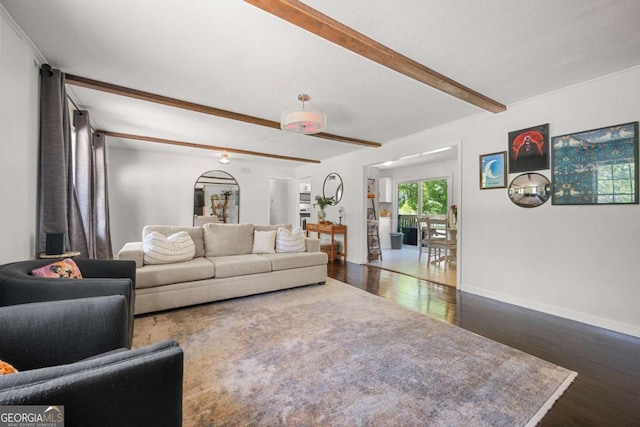 3770 Ponderosa Ln, Powder Springs, GA 30127 - living room featuring dark wood-style flooring, beamed ceiling, and baseboards