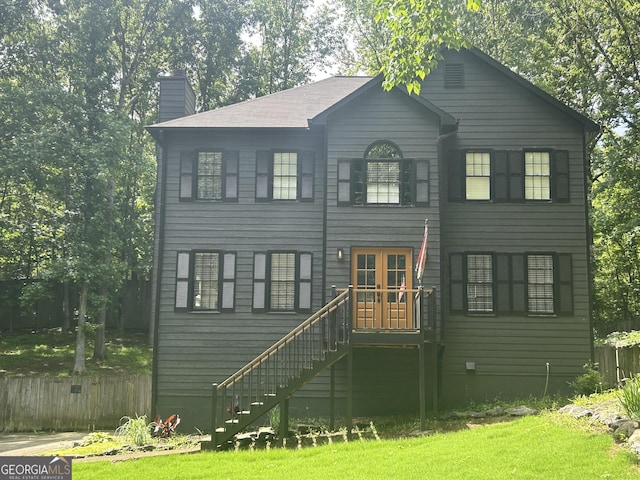 526 Lakeside Dr, Hiram, GA 30141 - view of front of property with a chimney, french doors, and stairs