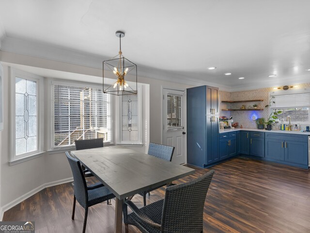 526 Lakeside Dr, Hiram, GA 30141 - dining space featuring a chandelier, baseboards, ornamental molding, dark wood finished floors, and recessed lighting