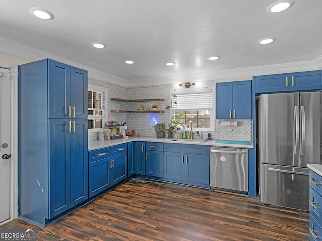 526 Lakeside Dr, Hiram, GA 30141 - kitchen featuring stainless steel appliances, a sink, crown molding, blue cabinets, and light countertops