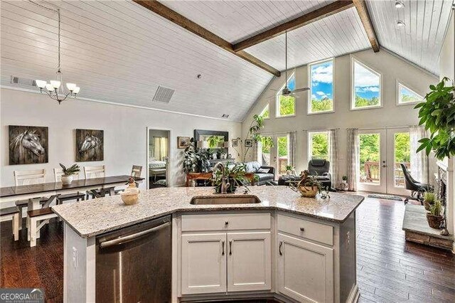 163 Thompson Ln, Jasper, GA 30143 - kitchen with open floor plan, stainless steel dishwasher, a sink, beamed ceiling, and light stone countertops