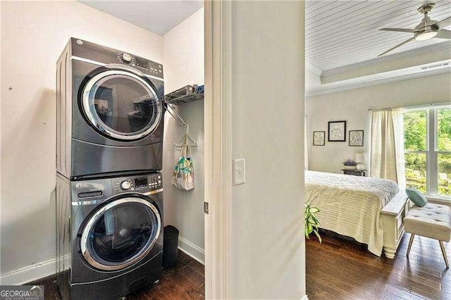 163 Thompson Ln, Jasper, GA 30143 - laundry room with estacked washer and dryer, crown molding, hardwood / wood-style floors, a ceiling fan, and baseboards