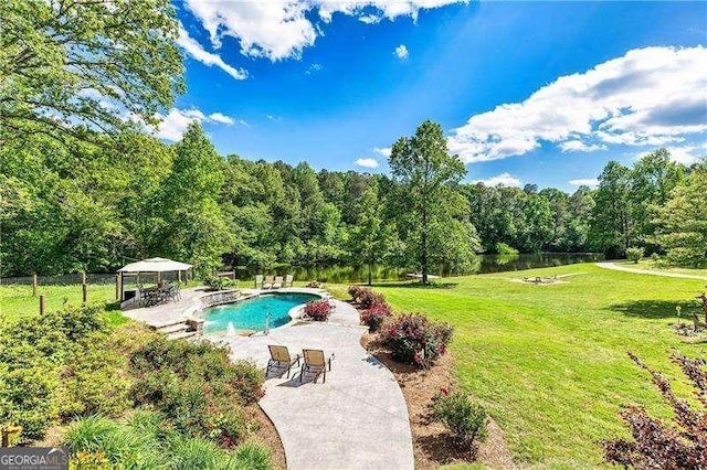 163 Thompson Ln, Jasper, GA 30143 - outdoor pool with a gazebo, a lawn, a patio area, and a forest view