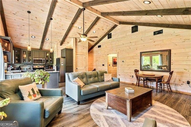163 Thompson Ln, Jasper, GA 30143 - living room with wood ceiling, wooden walls, wood finished floors, beamed ceiling, and high vaulted ceiling