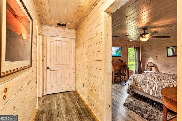 163 Thompson Ln, Jasper, GA 30143 - hall with wood ceiling, wood walls, and dark wood-type flooring