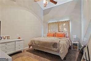 210 Cottonwood Creek Cir, Canton, GA 30114 - bedroom with a ceiling fan and baseboards