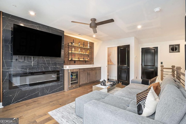 2505 Astaire Ct NW, Atlanta, GA 30318 - living room featuring bar area, ceiling fan, wood finished floors, wine cooler, and recessed lighting