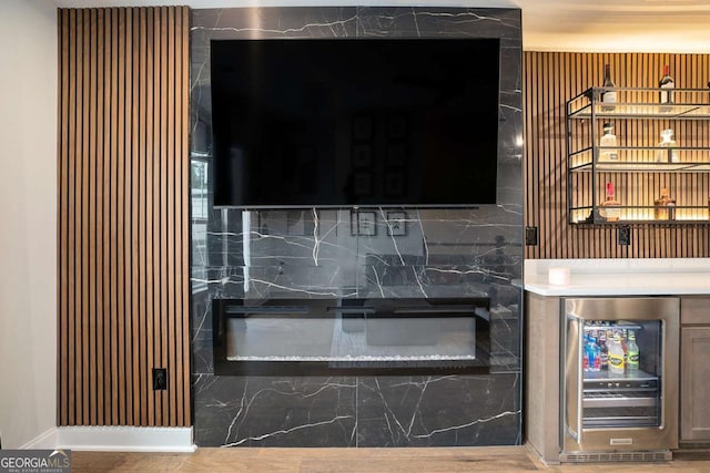 2505 Astaire Ct NW, Atlanta, GA 30318 - detailed view of wine cooler, baseboards, and decorative backsplash