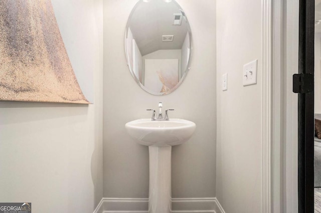 2505 Astaire Ct NW, Atlanta, GA 30318 - bathroom featuring baseboards