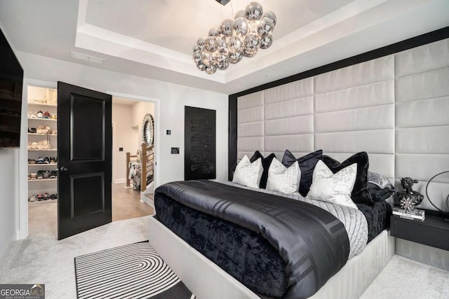 2505 Astaire Ct NW, Atlanta, GA 30318 - carpeted bedroom with a raised ceiling and baseboards